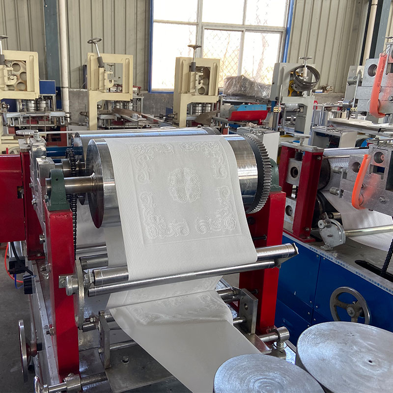 Napkin tissue machine (44)